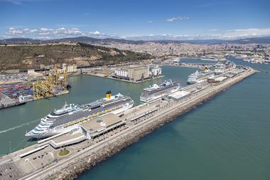 Aerial shot of the Port of Barcelona showing four cruise ships at dock