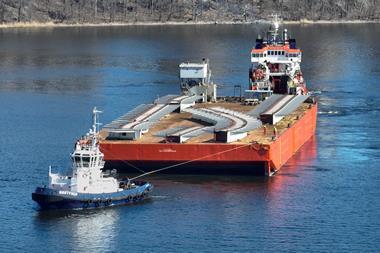 Bridge components being transport to the Ports of Stockholm by barge