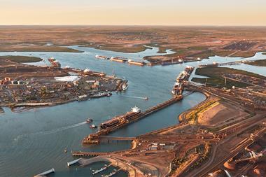 The image shows a overhead shot of the Port of Dampier