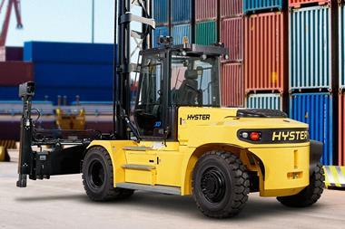 The image shows a Hyster J6-7XD-EC3/4 empty container handler on the quayside