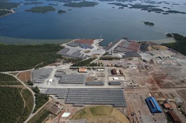 The image shows an overhead shot of Koverhar Harbour in Hank, Finland