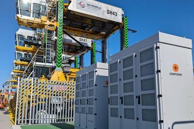 The image shows Kempower power units next to electric port cargo handling equipment
