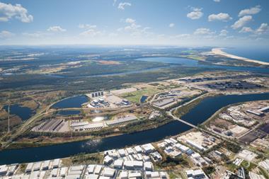 The image shows an aerial shot of Australia's Port of Newcastle