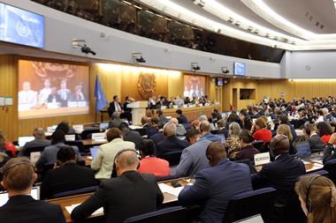 The photo shows a panoramic shot of the IMO's MEPC 83 meeting from 7 to 11 April 2025