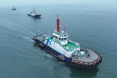 The image shows the Qing Dian Tuo 1 on the water