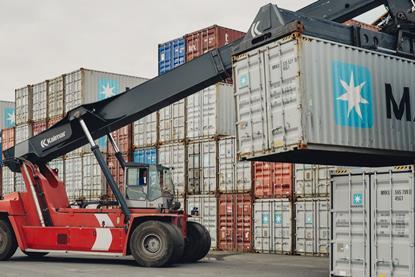 Kalmar forklift lifting a Maersk container