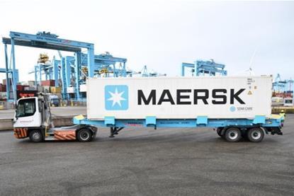 The image shows one of the electric automated terminal trucks (ATTs),