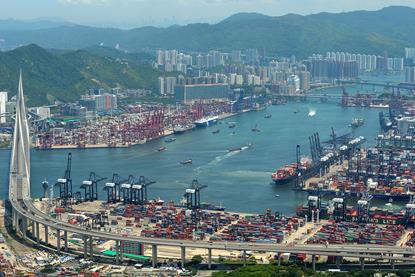 The image shows a wide angle shot of the terminals at the Port of Hong Kong