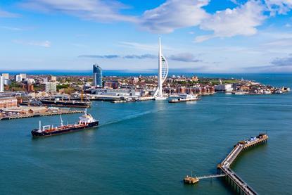 A wide angle shot of Portsmouth Harbour with the Spinnaker Tower in the background