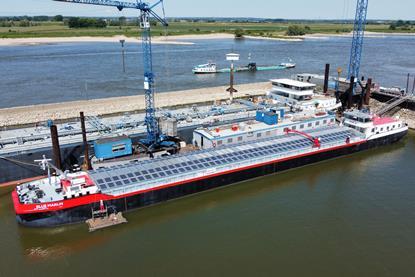 The Blue Marlin with its solar array is pictured moored at the quayside
