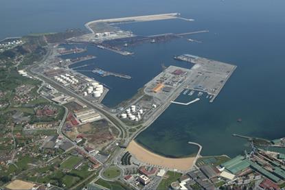 The image shows an aerial shot of the Port of Gijón