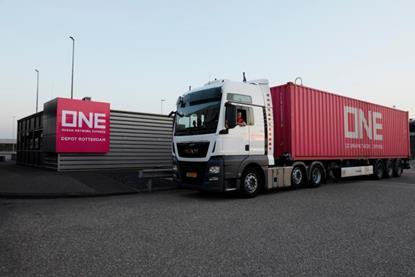 The image shows a ONE truck at QTerminals Kramer Rotterdam
