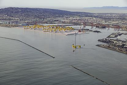 offshore wind turbine with port behind