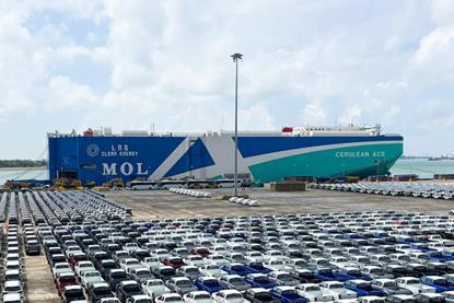 MOL RoRo container ship at the Port of Singapore with cars dockside