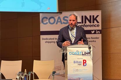 Johan-Paul Verschurre, director, Rebel Ports & Logistics on the podium