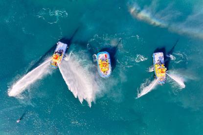 The photo shows an aerial shot of the new Trapananda tug on the water