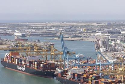aerial shot of the Port of Barcelona showing two containers ships