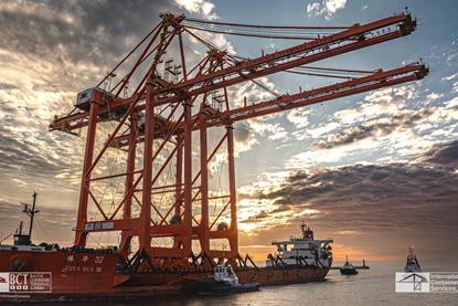 Two quay cranes arriving at the Port of Gdynia