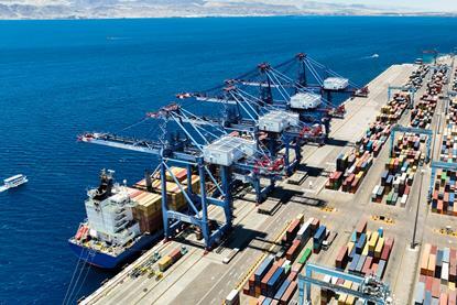 The image shows an aerial shot of Jordan ACT APM Terminals