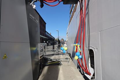 The image shows Viking Jupiter connecting to the new OPS facility on the quayside