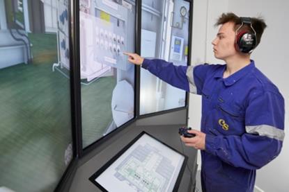 A young worker looking at a screen