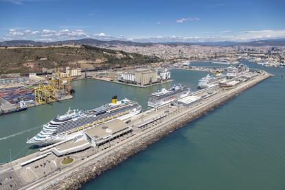 Aerial shot of the Port of Barcelona showing four cruise ships at dock