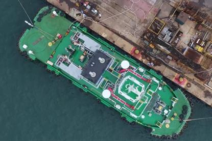 The image shows the Envision Energy ammonia bunkering operation at Dalian Port