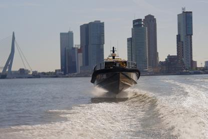 The image shows the Artemis EF-12 on the water at Rotterdam