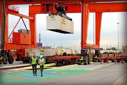 A picture of a container being lifted on the quayside