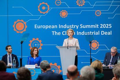The image shows EU President Ursula von der Leyen in Antwerp to present the details of the plan to EU business leaders gathered at the European Industry Summit