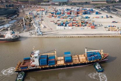 The image shows a view of the DP World terminal at Maputo