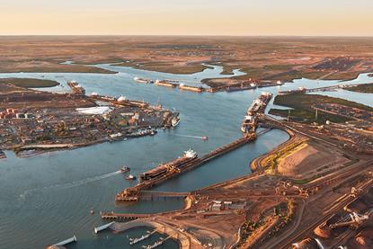 The image shows a overhead shot of the Port of Dampier