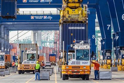 PORT-OF-LOS-ANGELES-LABOR-Dockworkers-move-cargo-on-a-container-terminal.-Photo-Port-of-Los-Angeles.