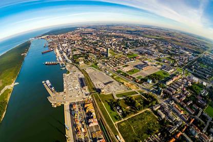 The image shows an overhead photo of the Port of Klaipėda