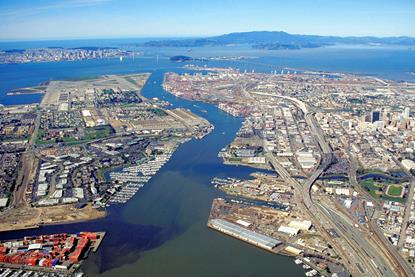 The picture shows an aerial image of the Port of Oakland