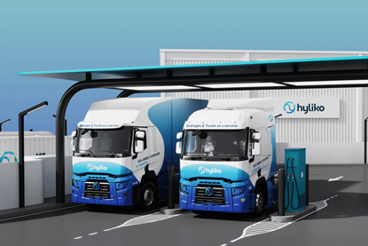 The image shows Hyliko hydrogen trucks ay the green hydrogen refuelling station