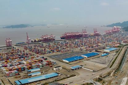 The image shows an aerial picture of the Port of Ningbo-Zhoushan