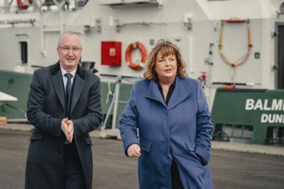 The picture shows Stuart Wallace (CEO Forth Ports) and Fiona Hyslop Cabinet Secretary for Transport