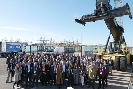 People standing on the quay at the Port of Valencia celebrating the finale of the H2Ports project