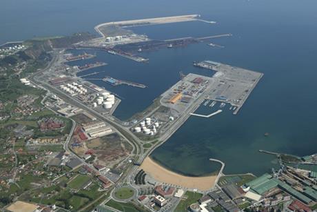 The image shows an aerial shot of the Port of Gijón