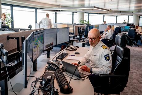 Staff working at computers at the Port of Rotterdam's HCC