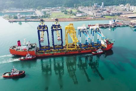 The image shows a vessel on the quayside at Kuantan Port