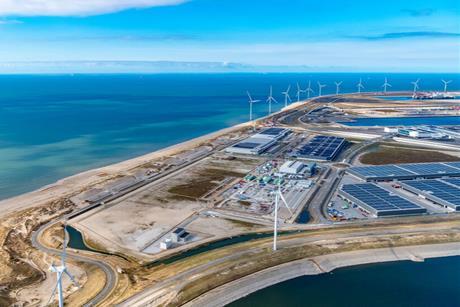 The image shows an aerial shot of the Maasvlakte at the Port of Rotterdam
