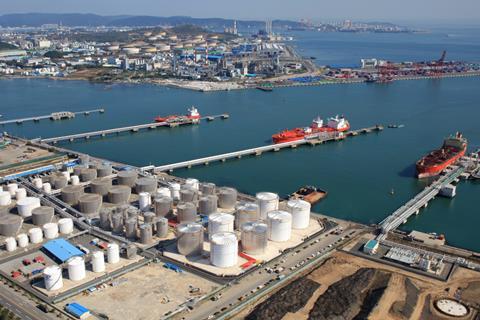 The image shows a wide angle shot of a vessel in berth at Ulsan's tank terminal
