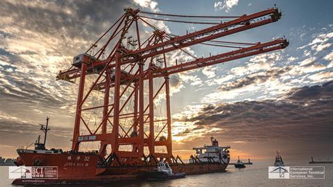 Two quay cranes arriving at the Port of Gdynia