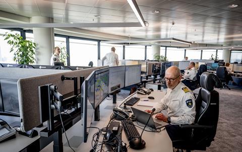 Staff working at computers at the Port of Rotterdam's HCC