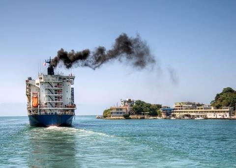 Ship emitting black smoke