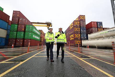 Peter Burke T.D., Minister for Enterprise, Tourism and Employment with Dublin Port CEO Barry O'Connell to mark the delivery of new refrigerated container infrastructure at Dublin Port.