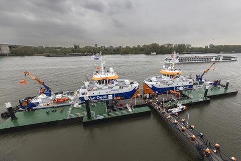 The image shows the christening service of Van Oord's two new hybrid water injection dredgers (WIDs), Rijn and Rhône