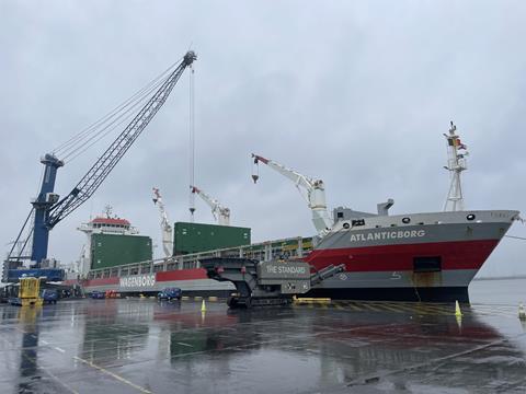 liebherr lhm 550 crane lifting cargo from the 'Atlanticborg'